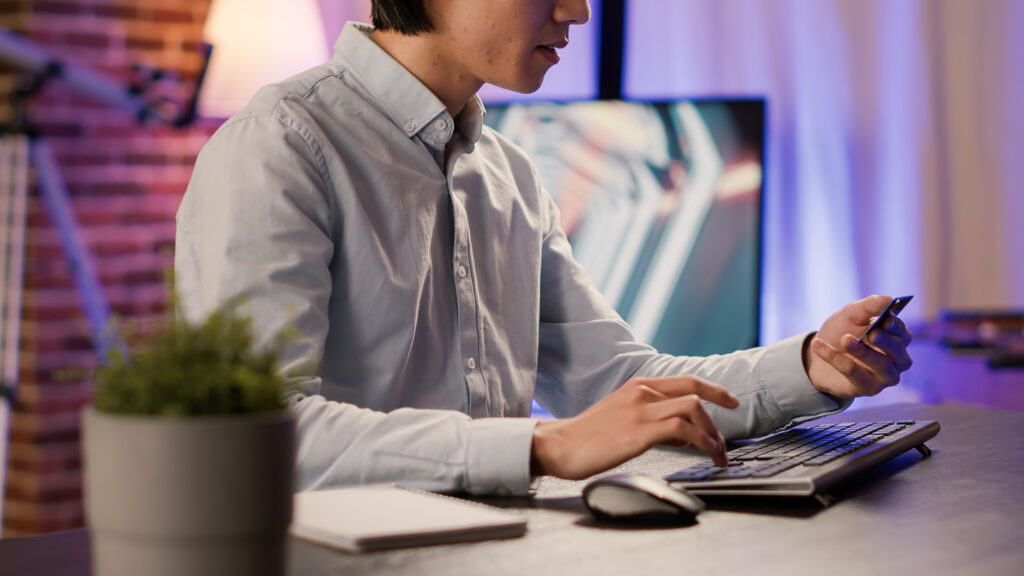 Entrepreneur doing online shopping with credit card on computer